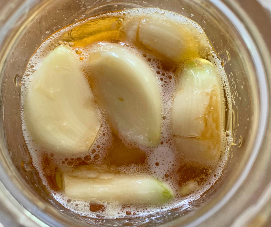 photo of garlic fermenting in honey