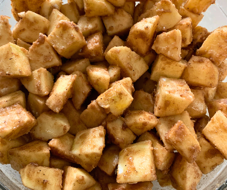 photo of apples in cinnamon sugar coating for apple crisp filling
